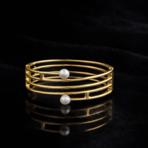 elegant pearl accent gold cuff bracelet